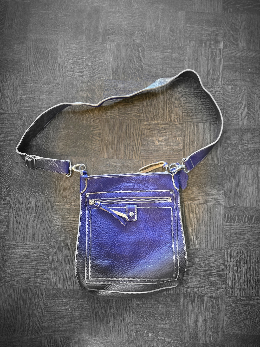 Roots Pebbled Leather Crossbody Bag in Purple